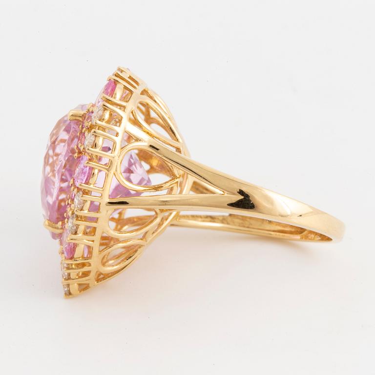 A kunzite, pink sapphire and diamond cock tail ring.