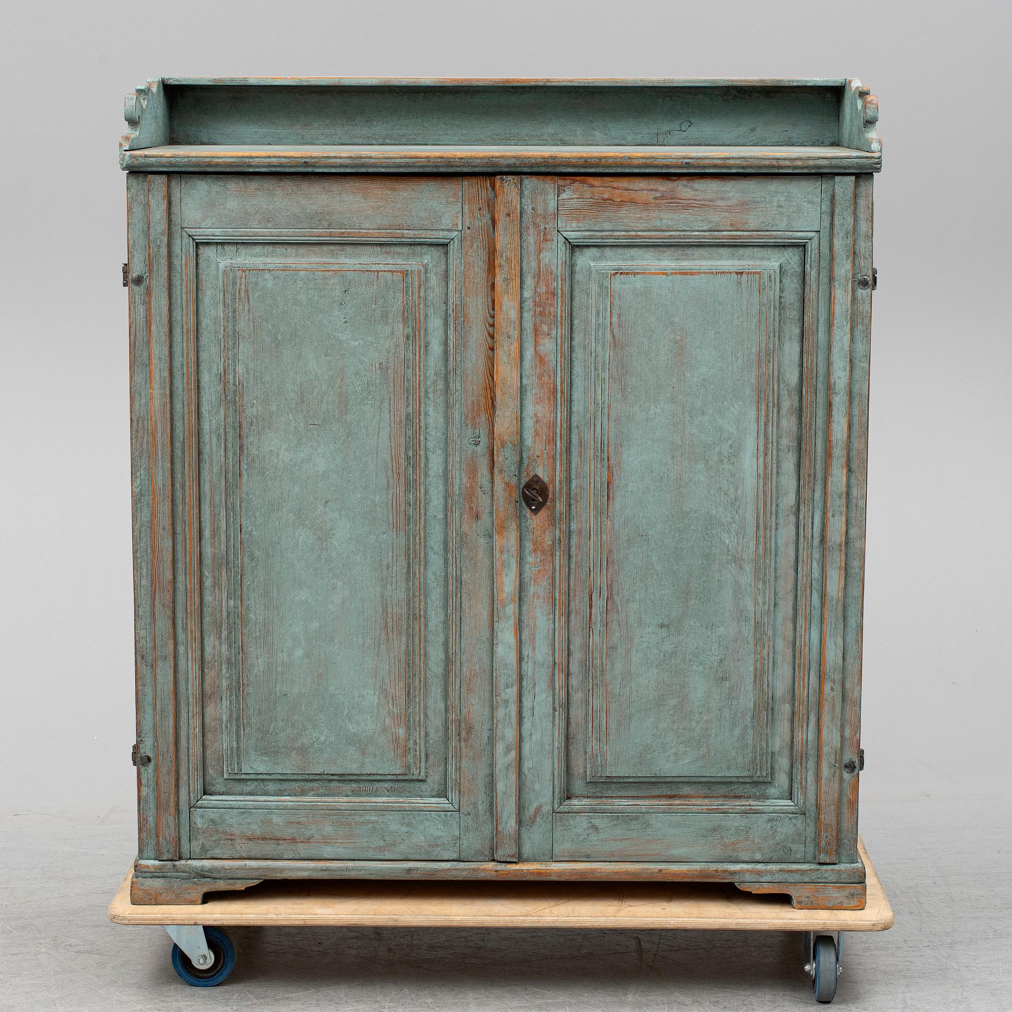 A first half of the 19th century painted cupboard.