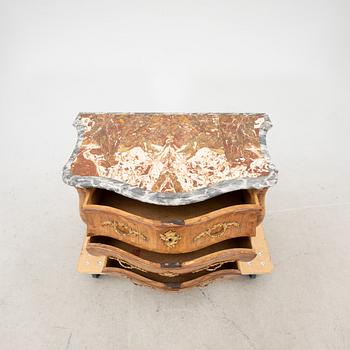 A mid 1700s Rococo dresser.