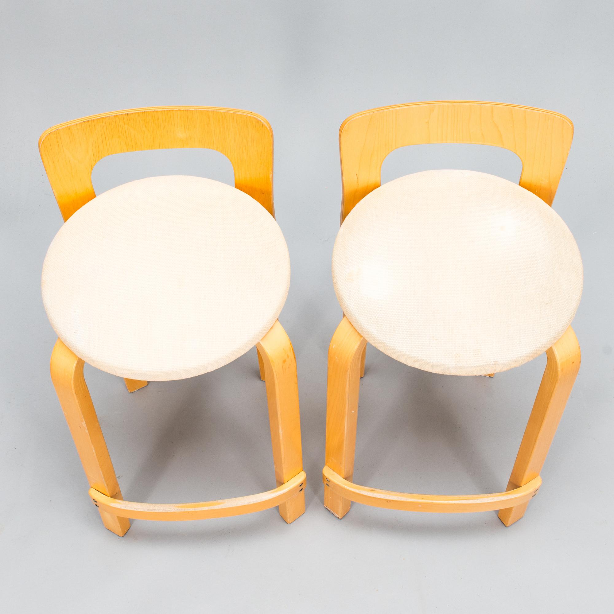 Alvar Aalto, Alvar Aalto, A pair of K65 bar stools, Artek, Finland, late 20th century.
