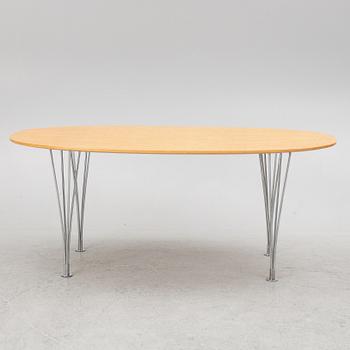 Bruno Mathsson & Piet Hein, a dining table/desk, 'Superellipse', Mathsson International, Värnamo, 1980s.