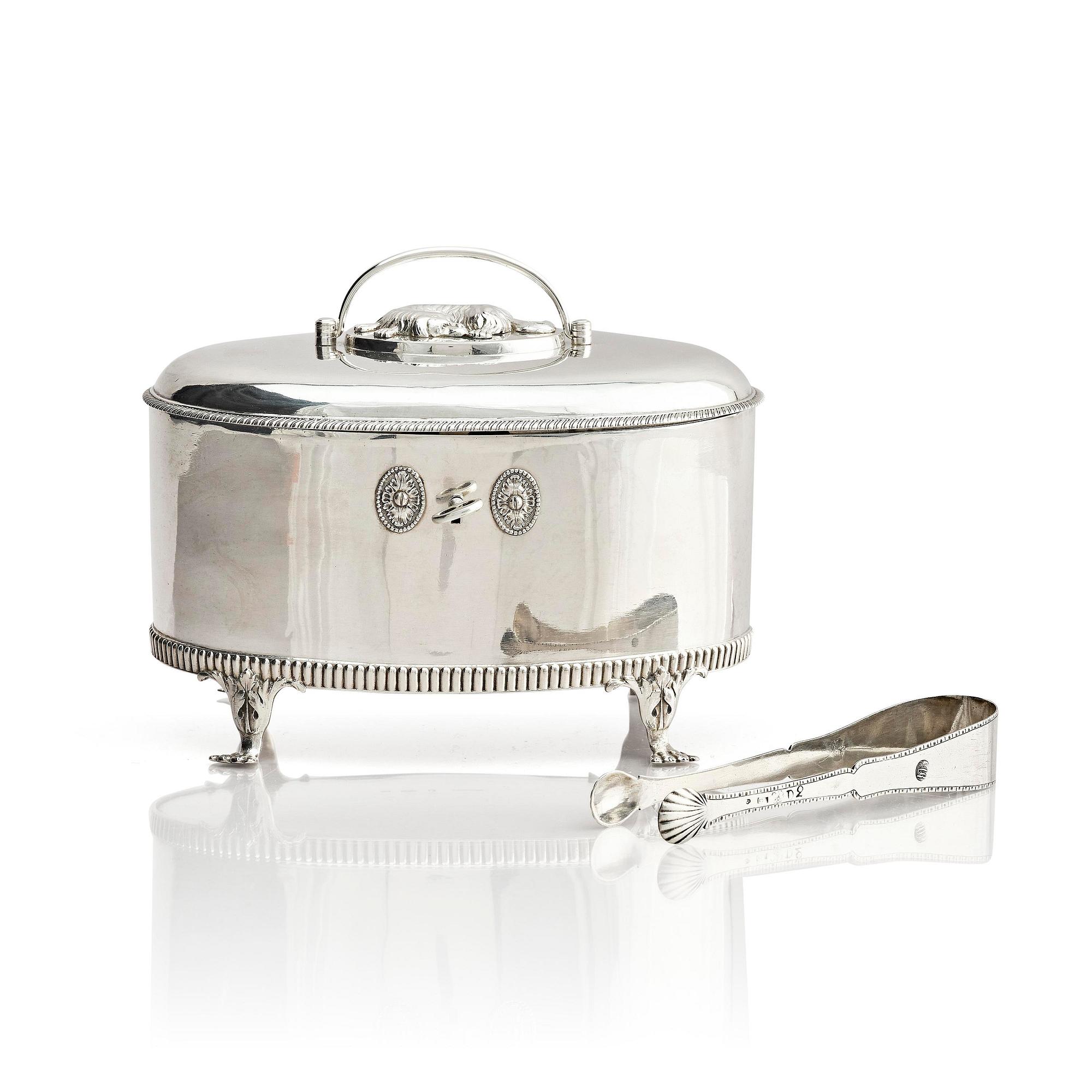 A Swedish 19th century silver sugar-casket and tong, marks of Adolf Zethelius, Stockholm 1819.