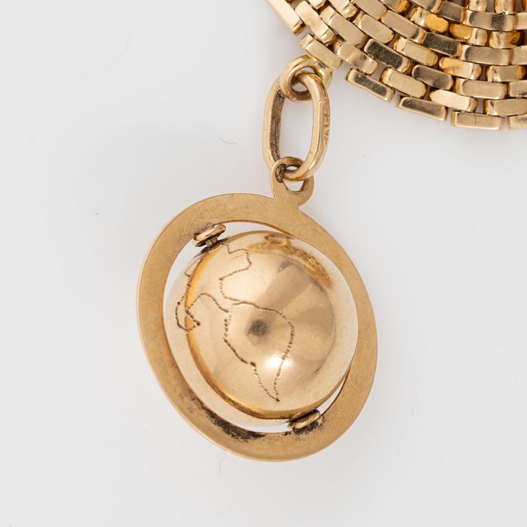Armband med berlocker guld 18K guld.