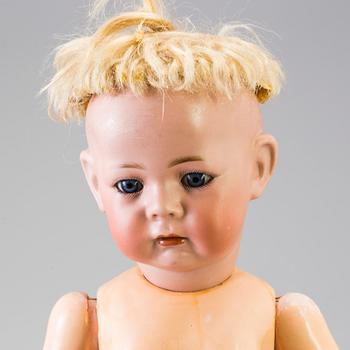 A bisque head character doll 115A by Kämmer & Reinhardt, Germany, ca 1911.