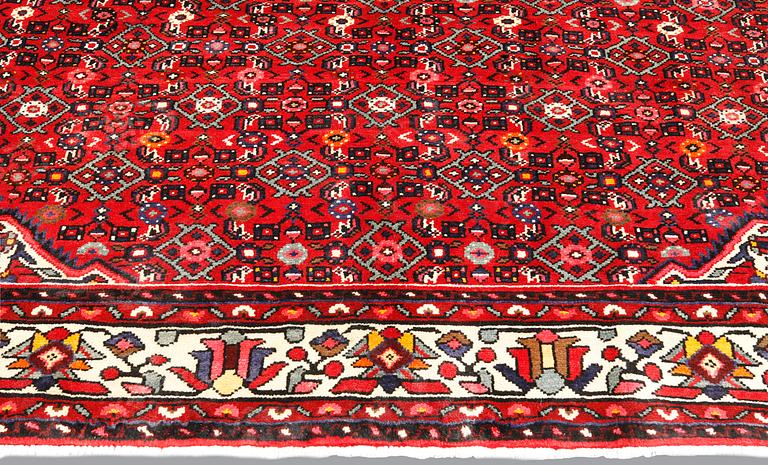 A Hosseinabad carpet, c 301 x 215 cm.