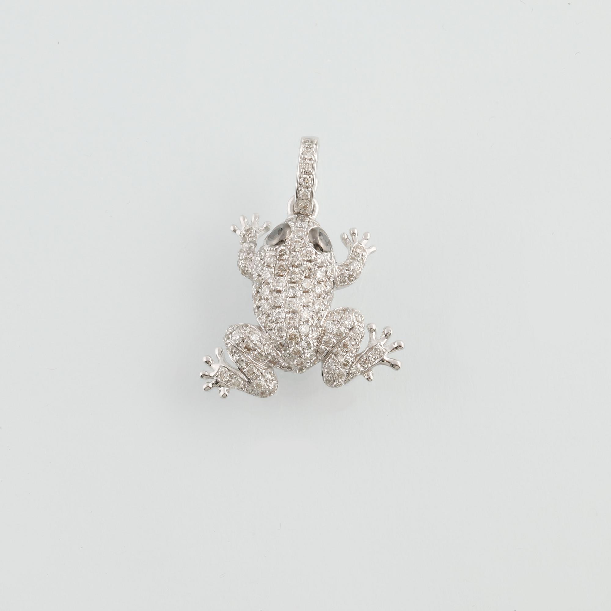 HÄNGE, 18K vitguld med 126 briljantslipade diamanter, 0.58 ct. Vikt 2,5 gram.
