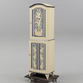 a Carl Malmsten "Island" cabinet.