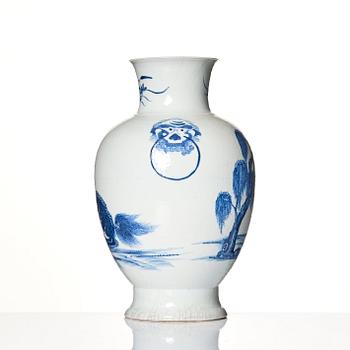 A blue and white bronze shaped vase with mythical creatures, Qing dynasty, 19th Century.