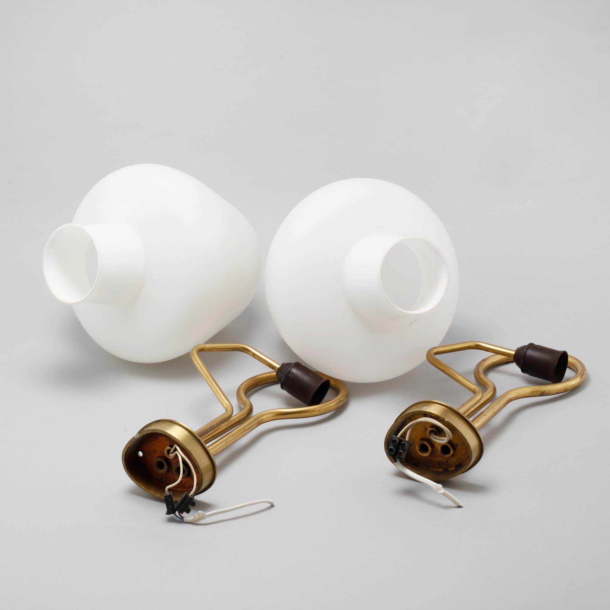 A pair of wall lamps from ASEA, around the mid 20th century.