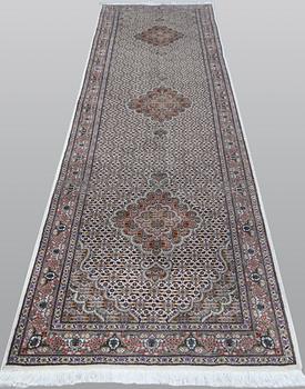 A part silk Tabriz runner, so-called 50 Raj, approx. 313 x 82 cm.