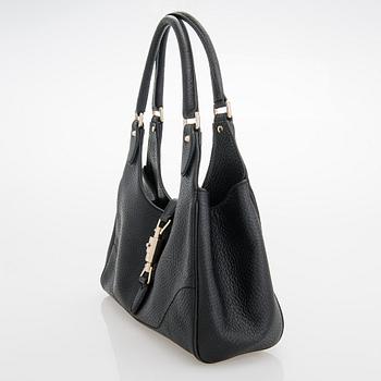 Gucci, A black leather 'Bardot' handbag.