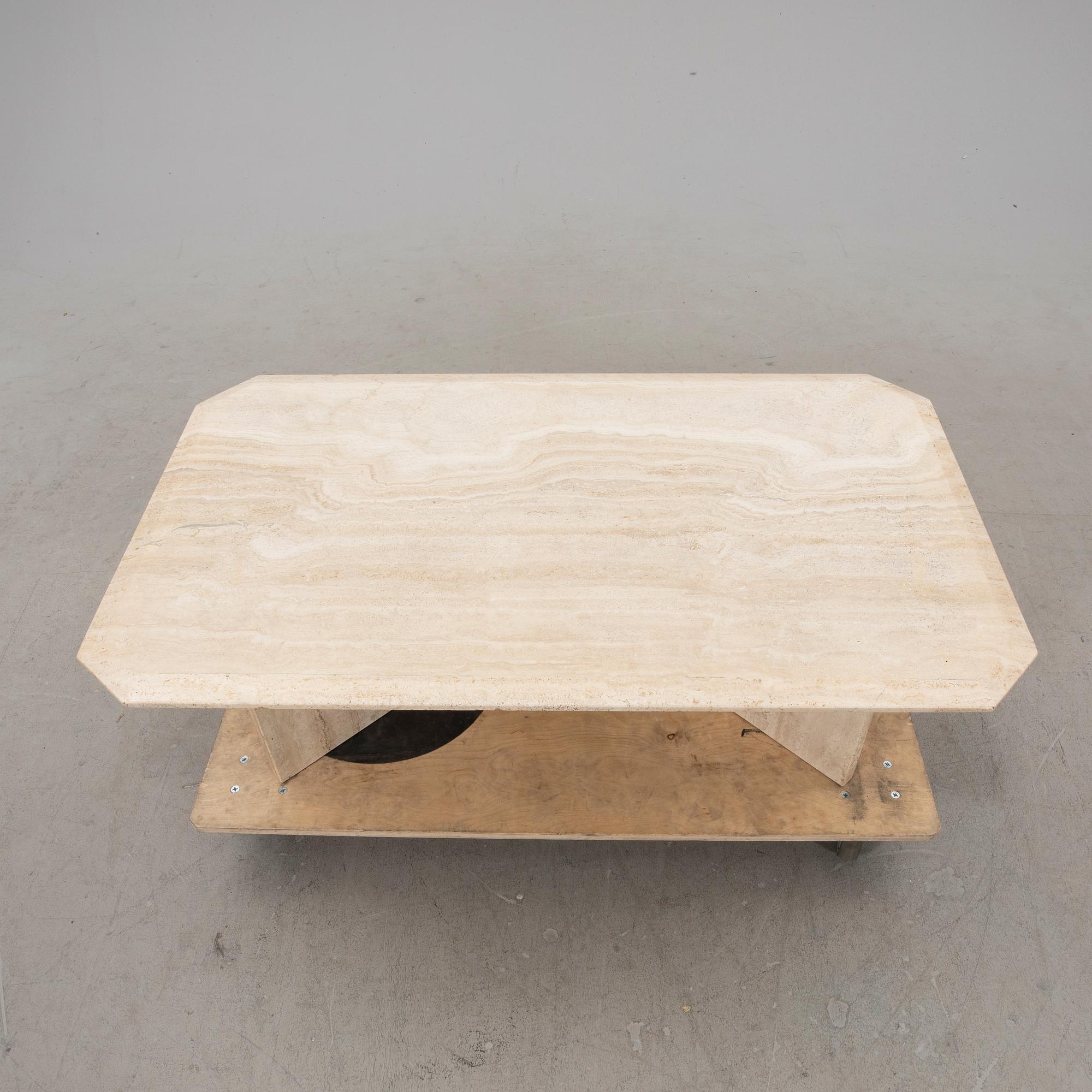 A late 20th century travertin  coffee table.