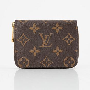 Louis Vuitton, "Zippy coin purse" wallet.