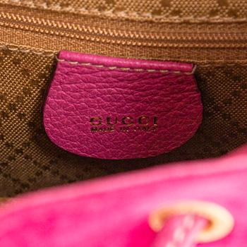 Gucci, a 'Bamboo' backpack.