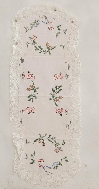 A collection of smaller Christmas tablecloths, runners, and wall hangings, approximately 34 pieces, mid/second half of the 20th century.