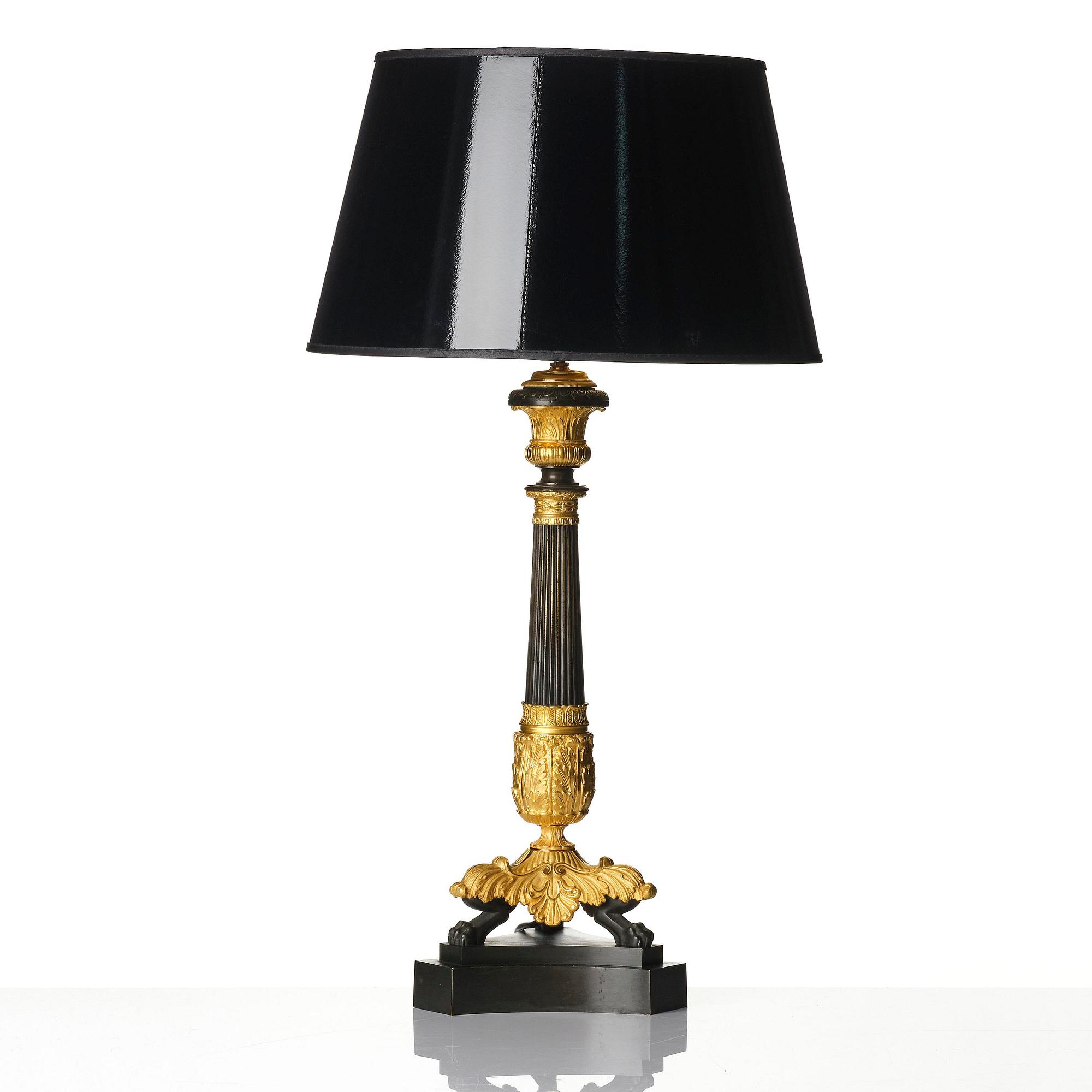 A French Louis Philippe ormolu and patinated bronze lamp, first part 19th century.