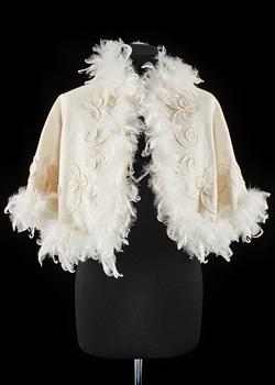 A cream colored silk wedding dress/evening dress by Mea.