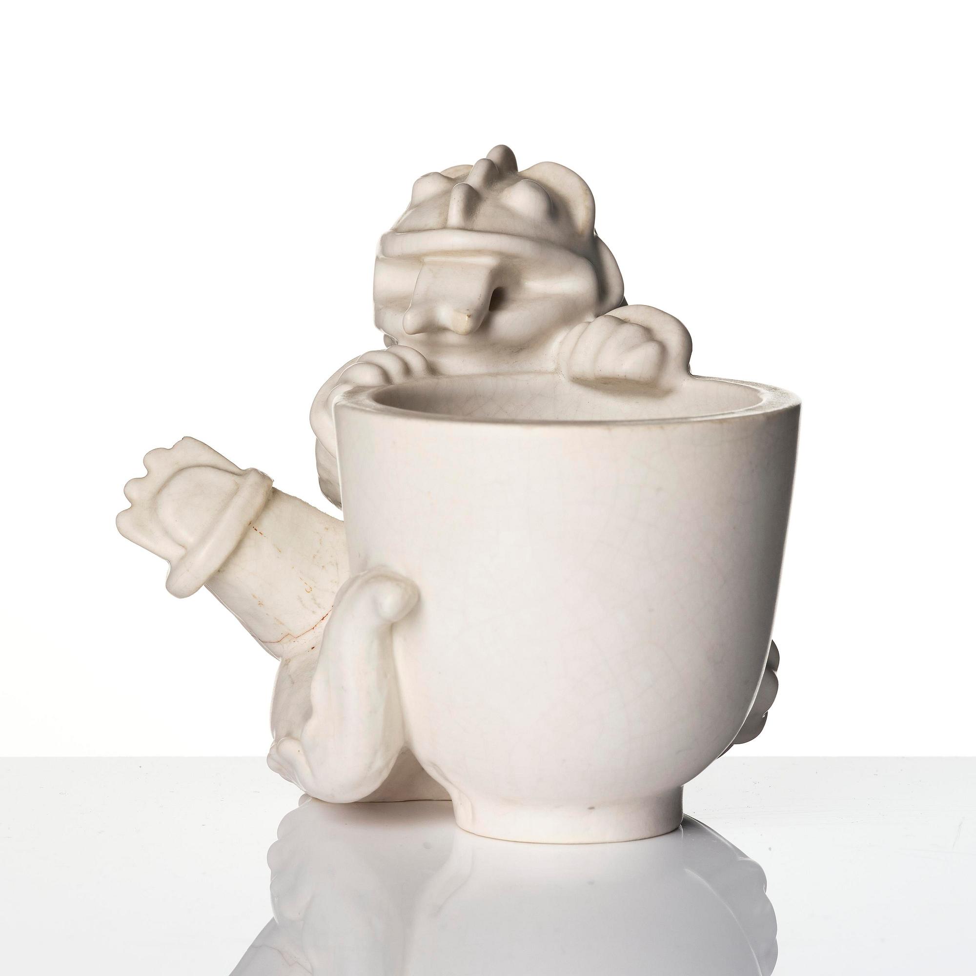 Wilhelm Kåge, a set of two stoneware sculptures of dragon puppies, Gustavsberg, Sweden 1940-50's.