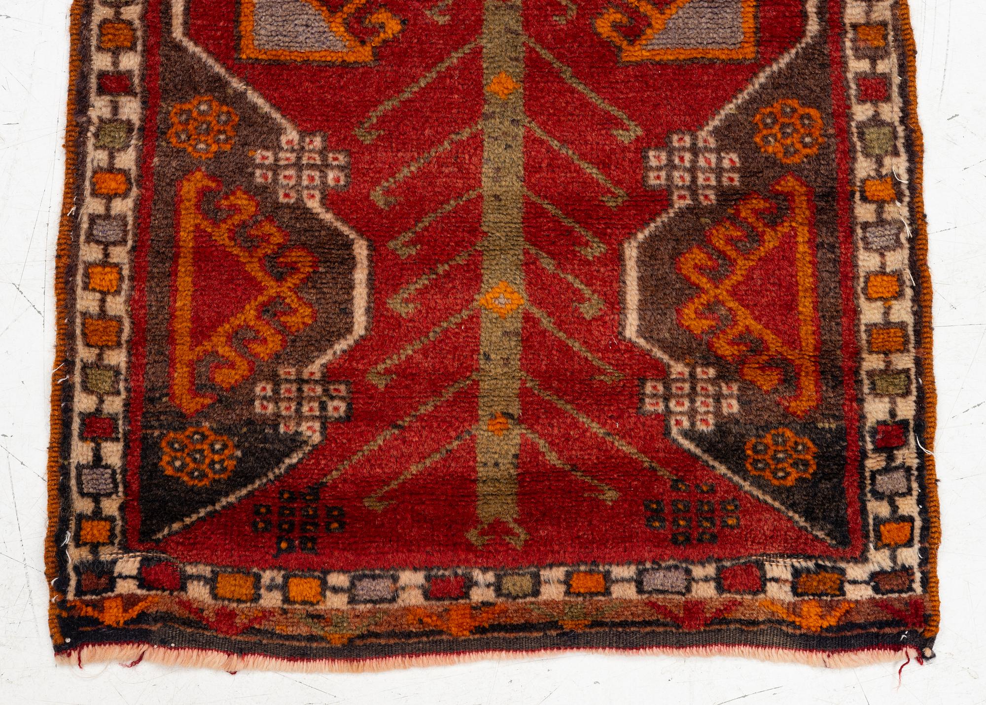 An antique, central Anatolian yastik fragment, c. 113 x 53 cm.