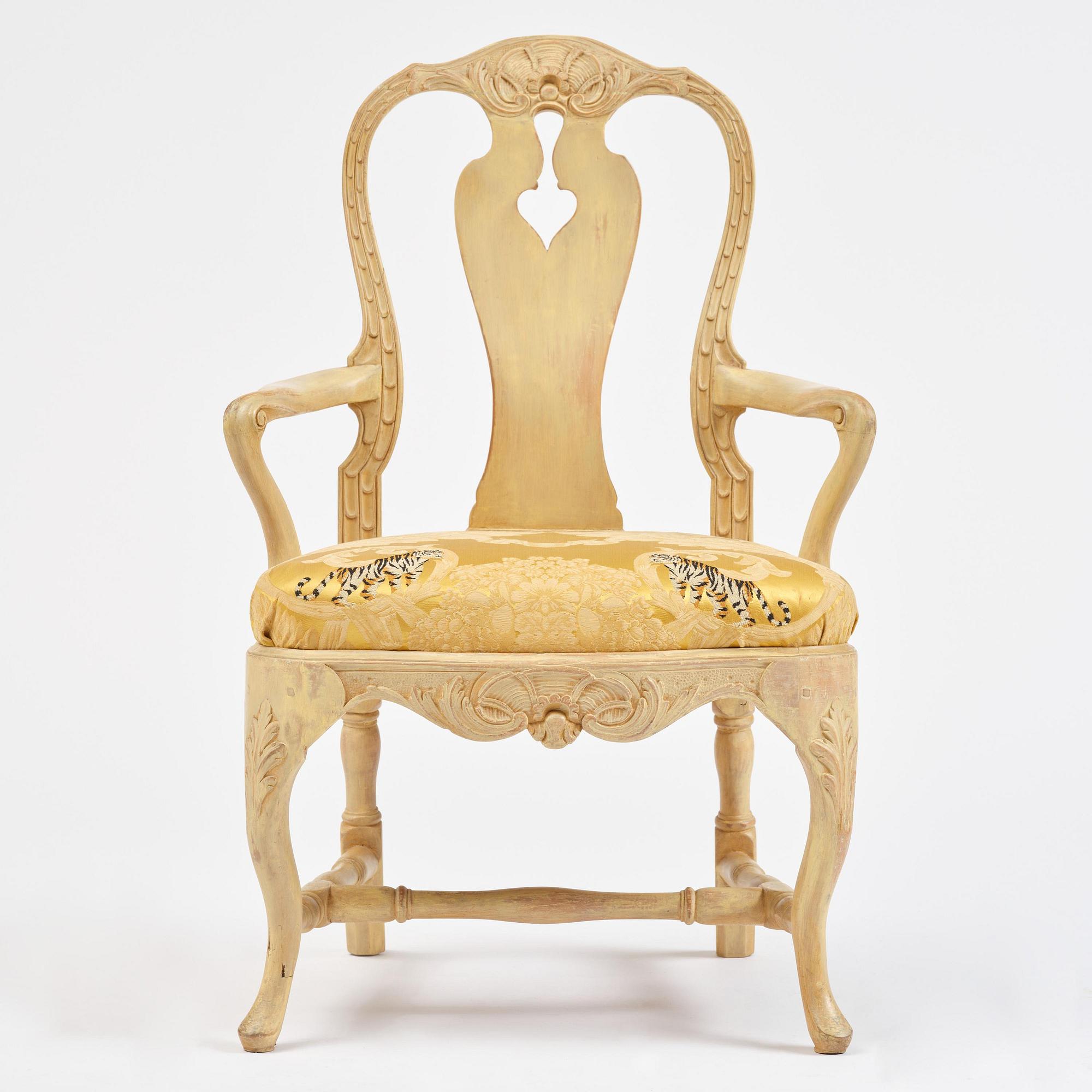 A rococo open armchair in the manner of C M Sandberg, Stockholm, later part 18th century.