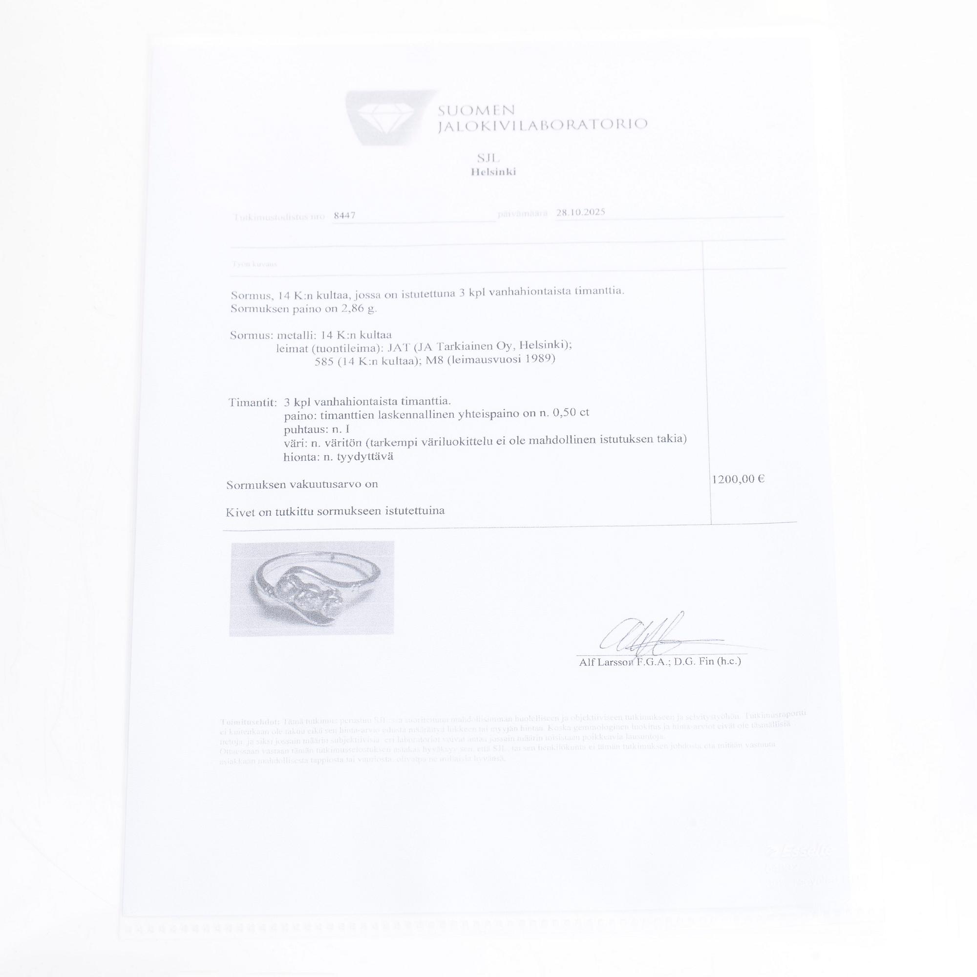 A 14K gold ring with old-cut diamonds.