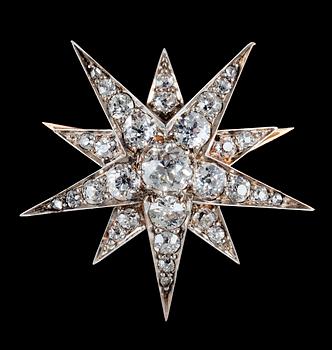 860. An old cut diamond star brooch, tot. app. 1.50 cts, 1880's.
