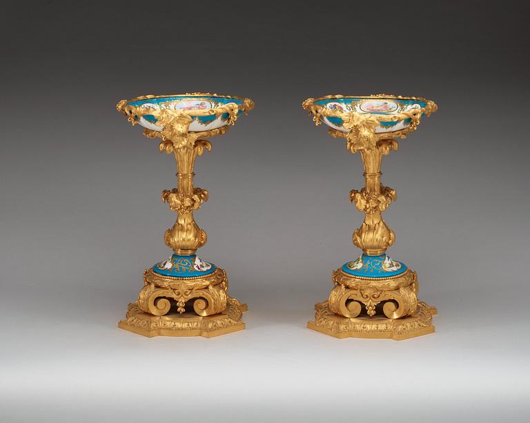 A pair of French porcelain and gilt bronze centrepieces, 18th and late 19th Century 'Sèvres'.