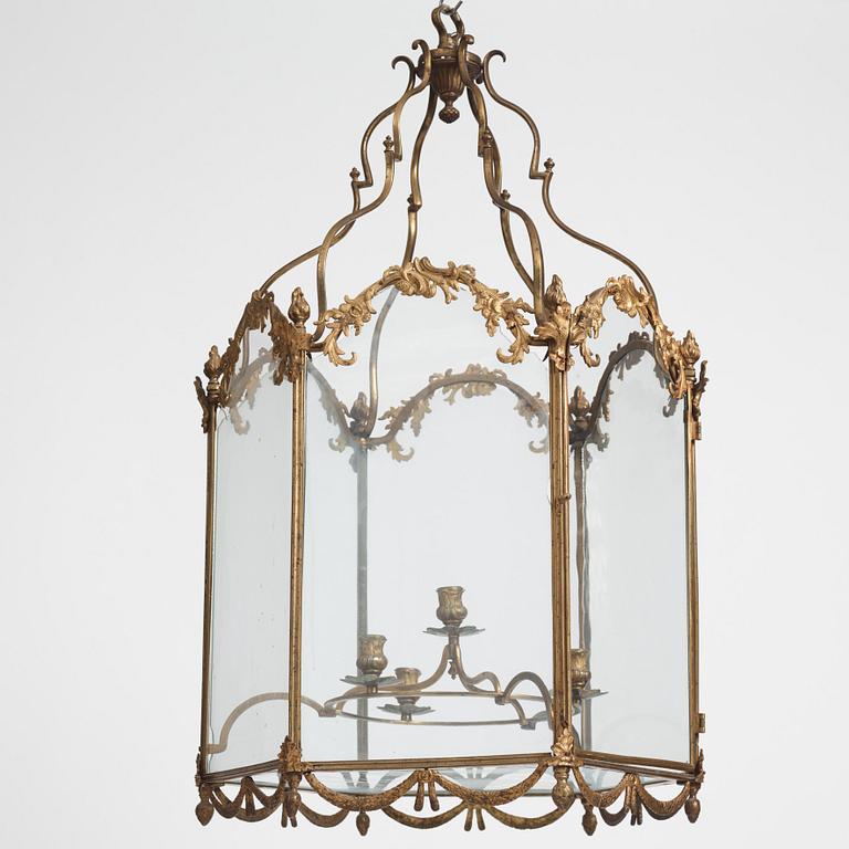 A Swedish rococo gilt-brass four-light lantern, possibly a masterpiece, Stockholm, later part of the 18th century.