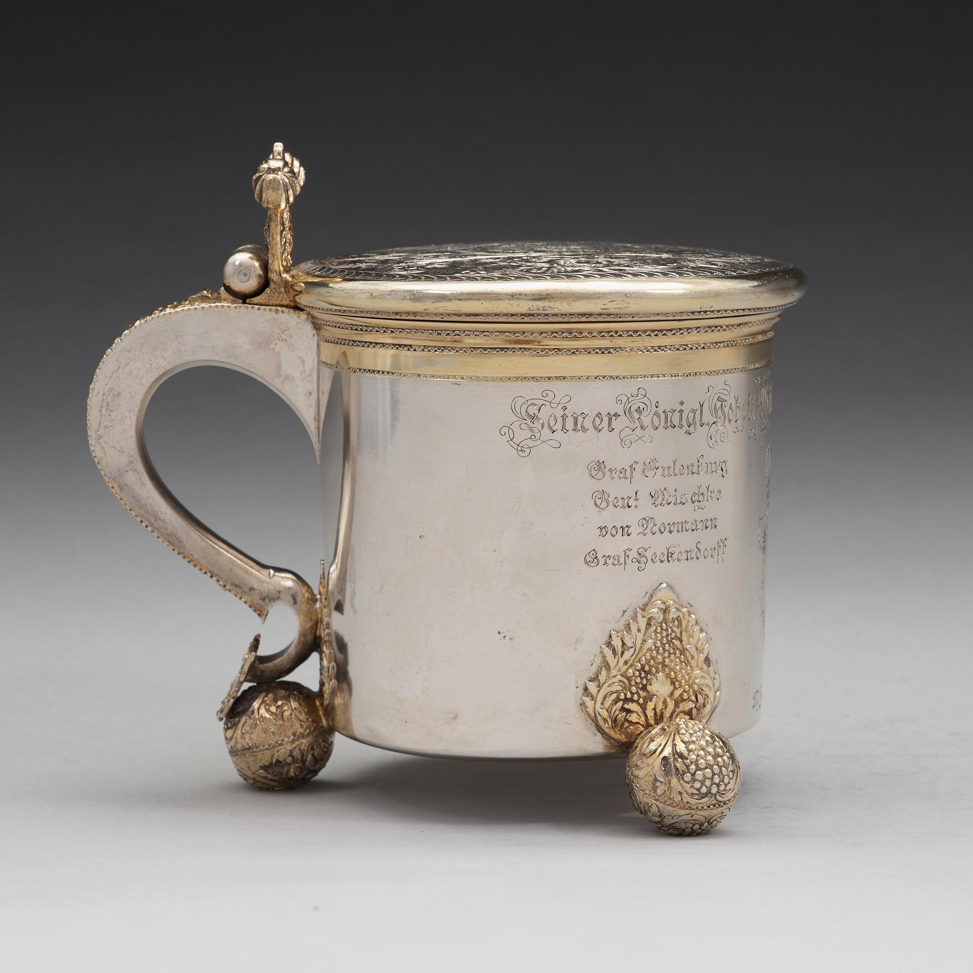 A Swedish early 18th century parcel-gilt silver tankard, mark of Sven Wallman, Gothenburg 1704.
