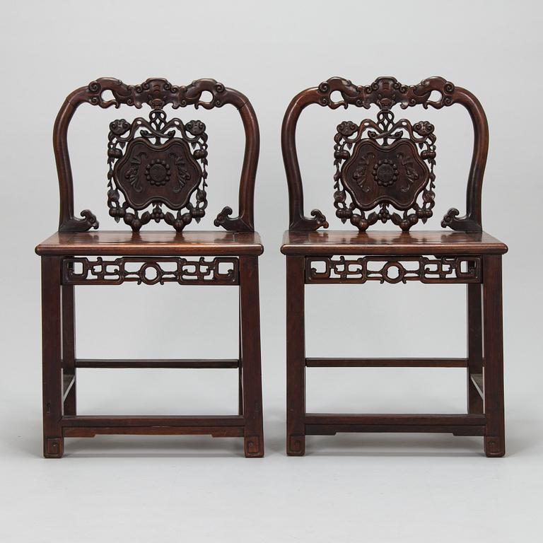 A pair of 20th-century Chinese chairs.