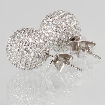 A pair of brilliant-cut diamond earrings. Total carat weight circa 4.12 cts.
