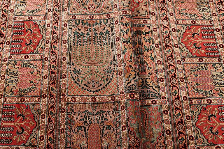 A carpet, silk Kashmir, ca 428 x 299 cm.