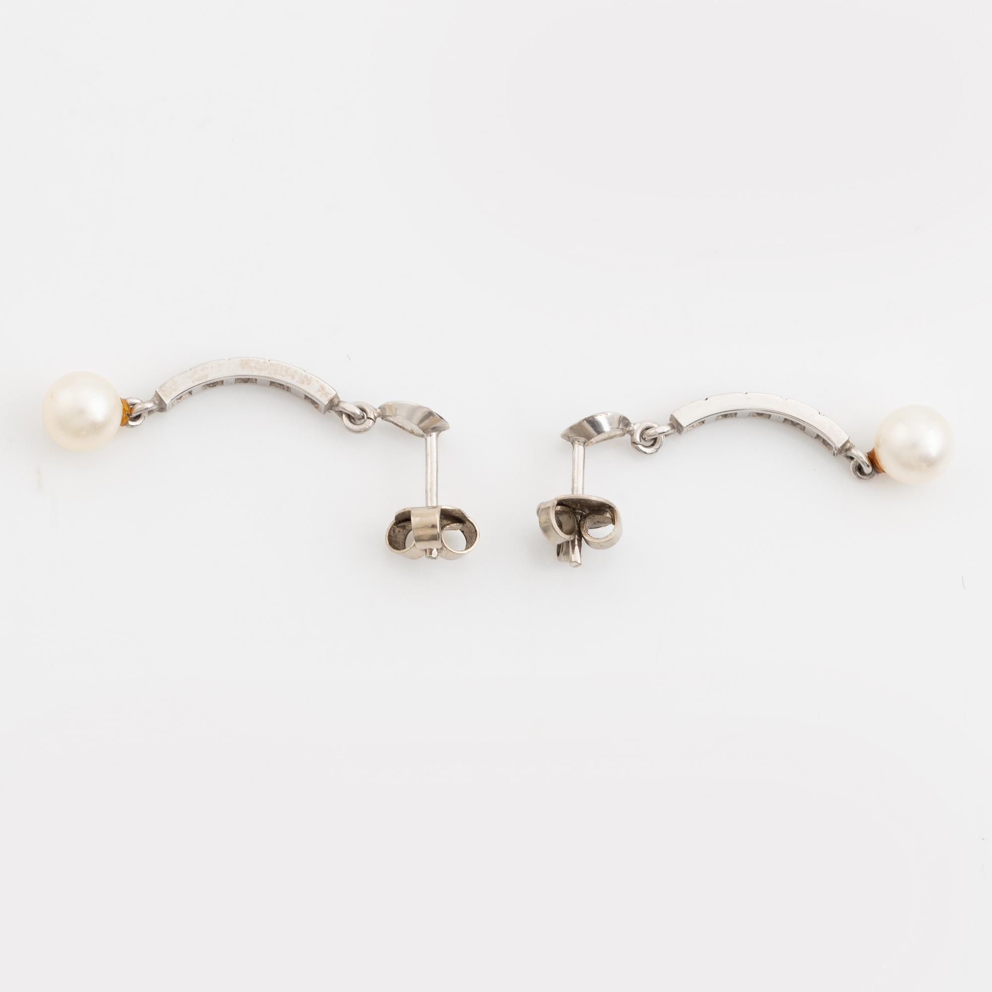 Necklace and earrings, a pair, cultured pearls, white gold, and brilliant- and octagon-cut diamonds.