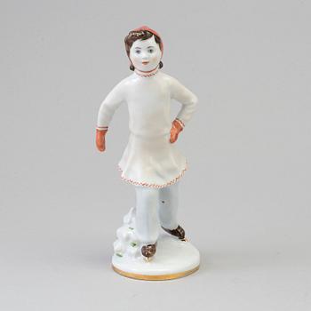 A early 20th century porcelain figurine from Russia.