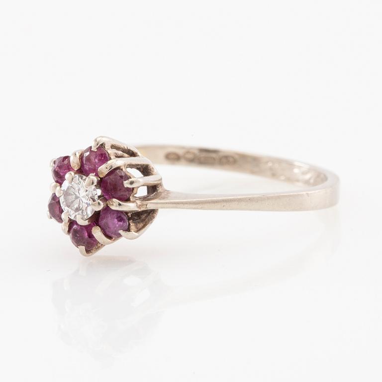 Ring 14K white gold set with a round brilliant-cut diamond and faceted rubies, Finland 1975.