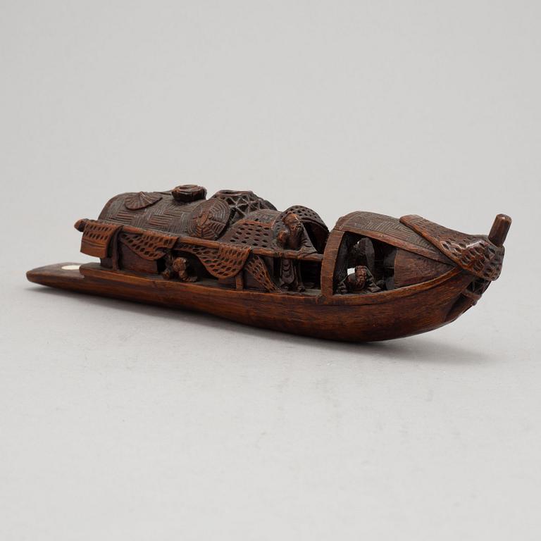 A Chinese bamboo sculpture of a boat, 20th Century.