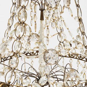 A gustavian style chandelier from the first half of the 20th century.