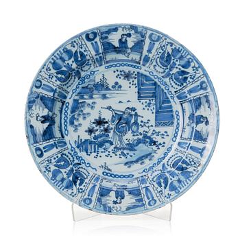 A large Dutch Delft faience charger, late 17th Century.