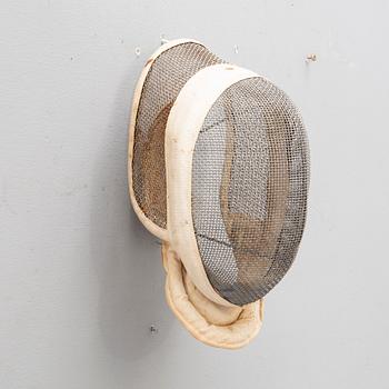 A French set of sword, mask and clothing for fencing, mid/second part of the 20th century.