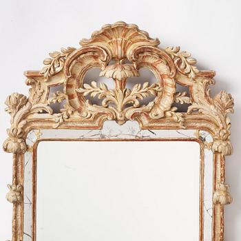 A Swedish rococo giltwood mirror attributed to N. Sundström (master in Stockholm 1754-81).