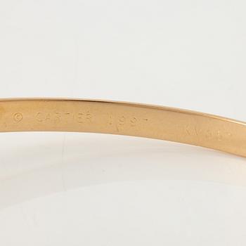 A Cartier bracelet "Trinity" 18K gold in three colours.