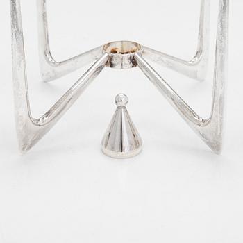 A four-candle silver candelabrum, maker's mark of Anna-Greta Eker, Auran Kultaseppä, Turku 1965.