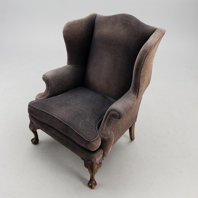 A late 20th century wing chair.