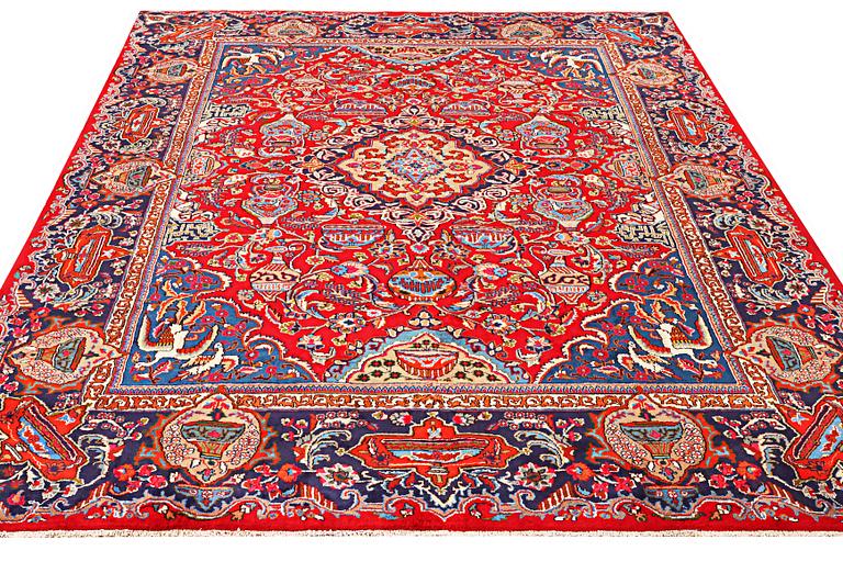 A Kashmar carpet, a. 376 x 298 cm.