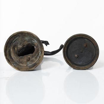 Two bronze sculptures.