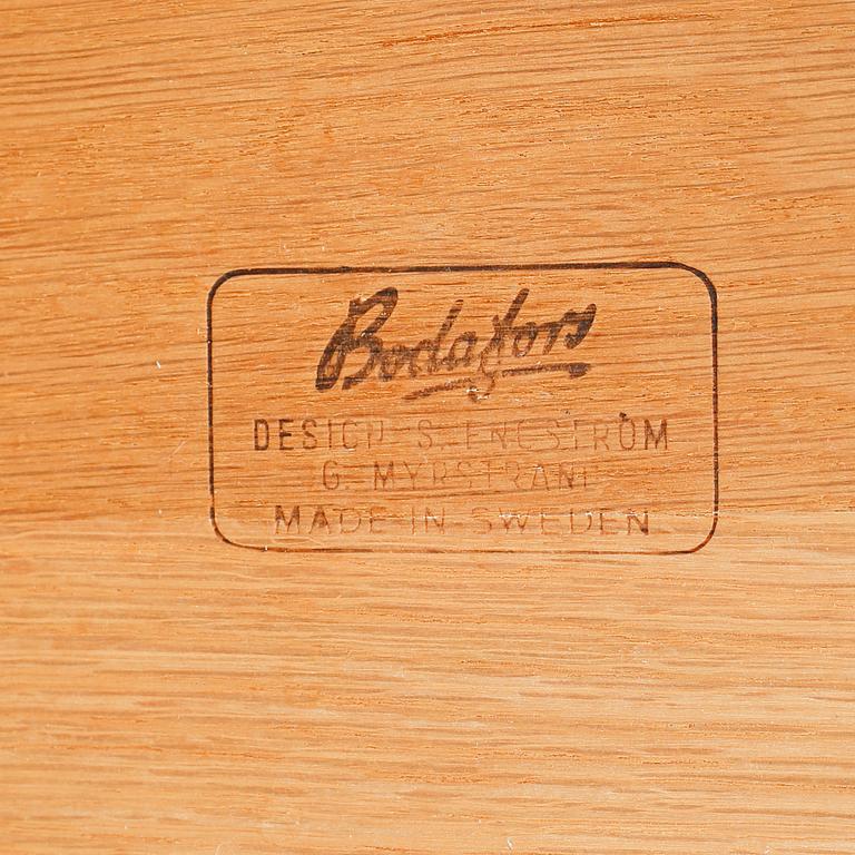 A pair of bedside tables by Sven Engström & Gunnar Myrstrand for Bodafors, third quarter of the 20th century.