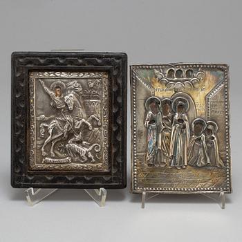 Two silver covered icons, one Russian 19th century,