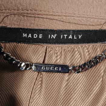 GUCCI, a beige wool and cashmere coat.