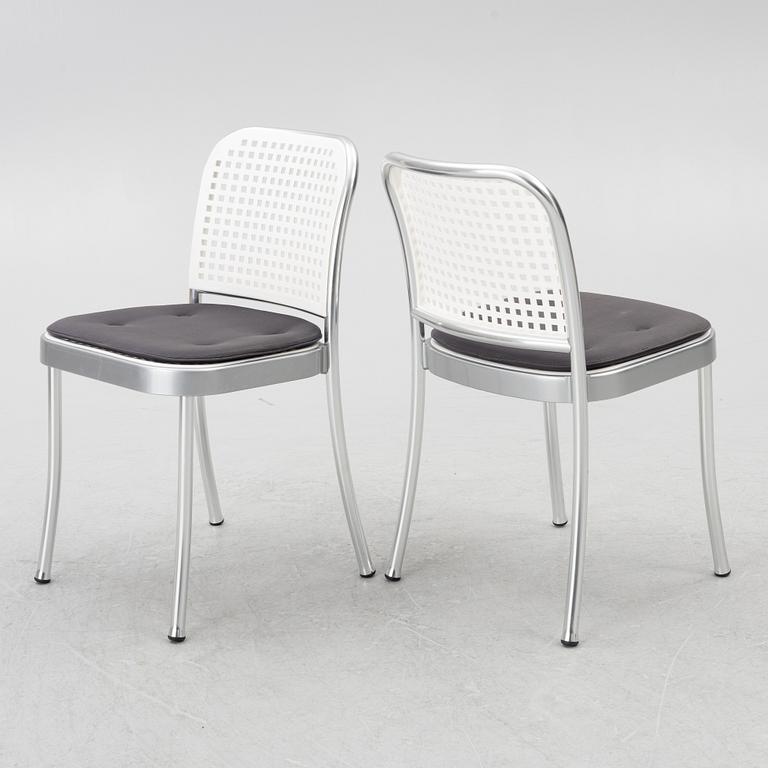 Vico Magistretti, a "Shine" dining table with twelve chairs, De Padova, Italy, around the year 2000.