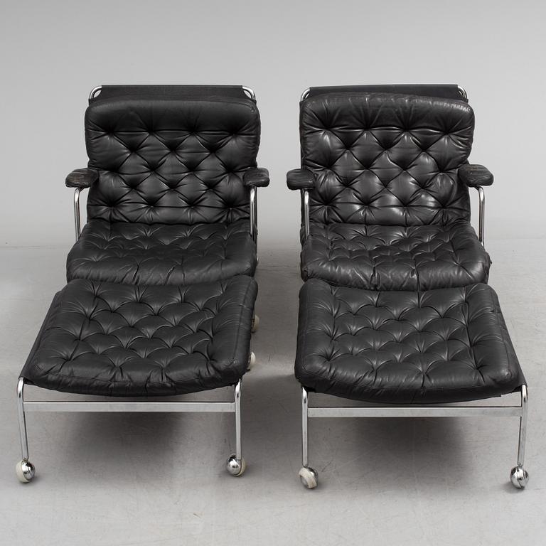 A pair of easy chairs with ottoman, "Karin" by Bruno Mathsson, DUX.